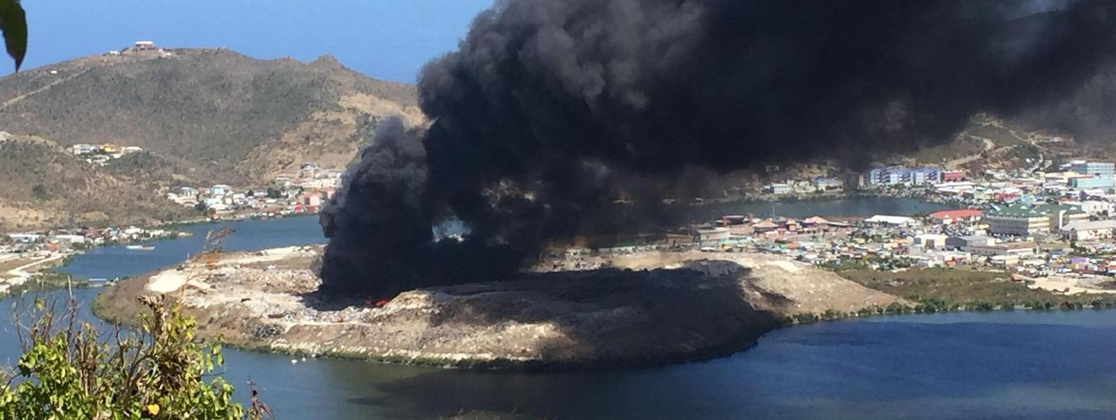 Medical waste from operating room burned atop the dump