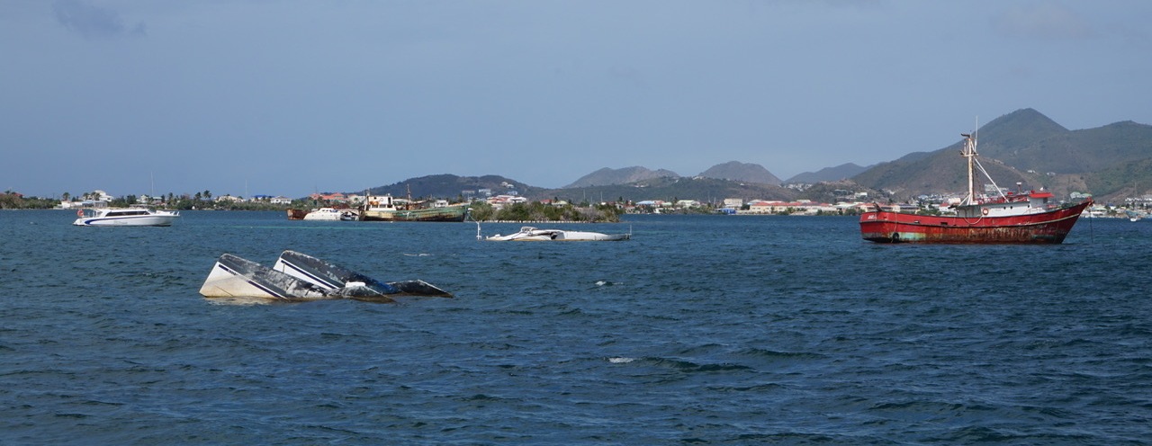 What will happen to the shipwrecks in Simpson Bay?